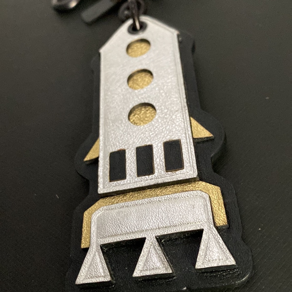 F57238 Coach NASA Silver Rocket Shuttle Leather Keychain FOB Bag Charm NWOT - Picture 2 of 6